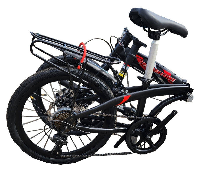 The folding pushbike folded in half, with the handlebars dropped alongside the frame