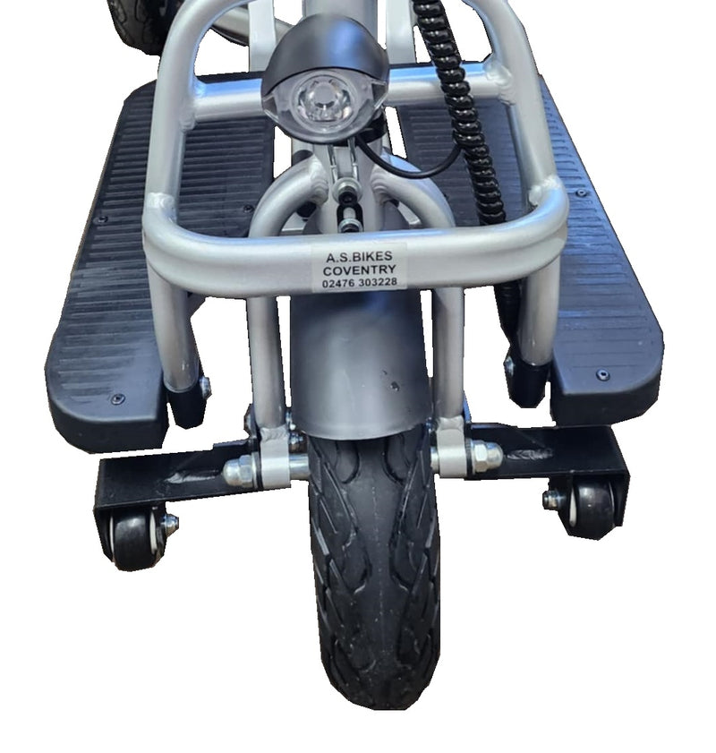 Close-up of the scooter's front wheel and stabiliser arms, with the AS Bikes Coventry label