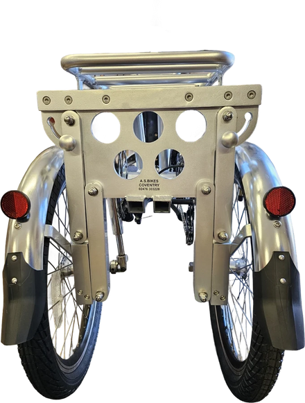 The AS tricycle fully folded, seen from behind, with the rear wheels tucked in to just 16 inches wide